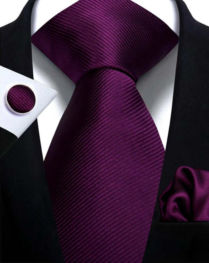 Boutons de manchette et cravate homme, couleur unie, pour un look sophistiqué et complet.