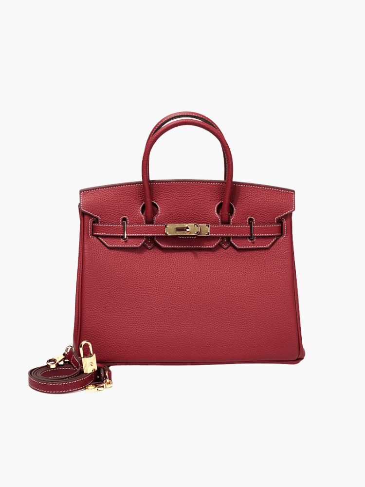 Sac à main en cuir pour femme, style classique avec poches intérieures sécurisées.