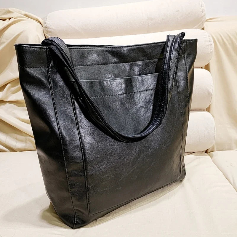 Grand sac cabas élégant en cuir PU pour femme, parfait pour le shopping ou les affaires.