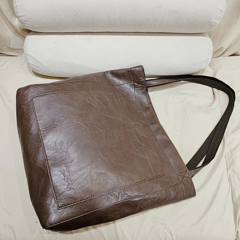 Sac épaule femme tendance en cuir PU, élégant et grand pour transporter tous vos essentiels.