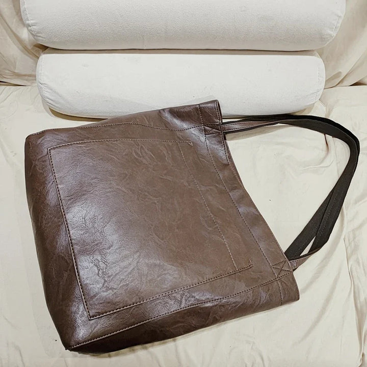 Sac épaule femme tendance en cuir PU, élégant et grand pour transporter tous vos essentiels.