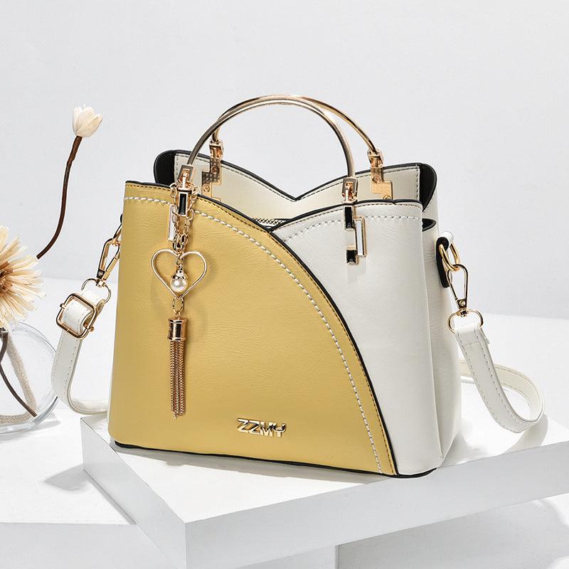 Accessoire de luxe: sac fourre-tout en cuir élégant pour femme, polyvalent, moderne et organisé.