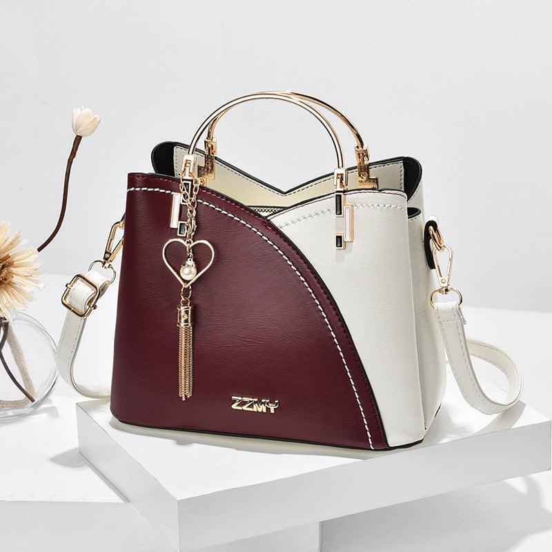 Sac fourre-tout de luxe pour femme active, en cuir, idéal pour le bureau et les sorties, avec organisation.