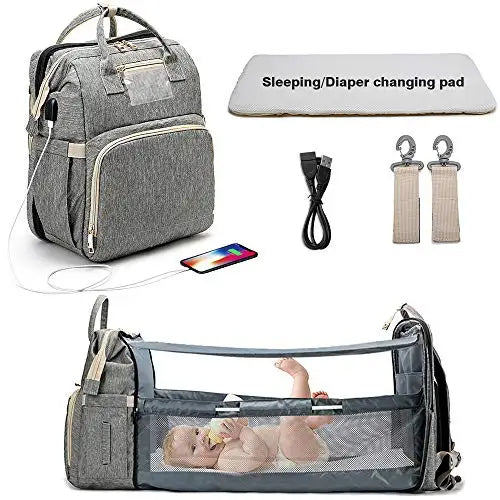 Sac à dos de maternité polyvalent, idéal pour voyager avec bébé, incluant un lit bébé pliant.