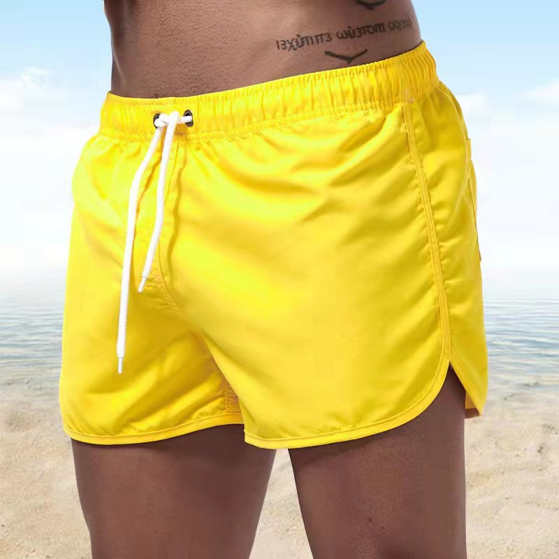 Short de bain homme uni Caspian avec coupe confortable et cordon de serrage, idéal pour les loisirs d'été.