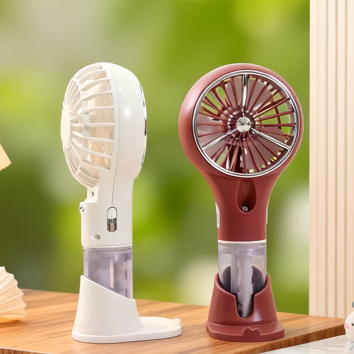 Ventilateur de main USB avec brumisateur, procure une fraîcheur rapide et agréable.