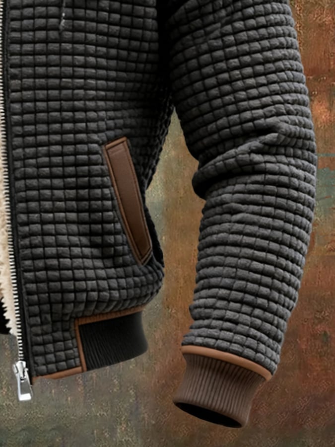 Doudoune homme chaude, veste matelassée offrant une excellente isolation thermique contre le vent froid.