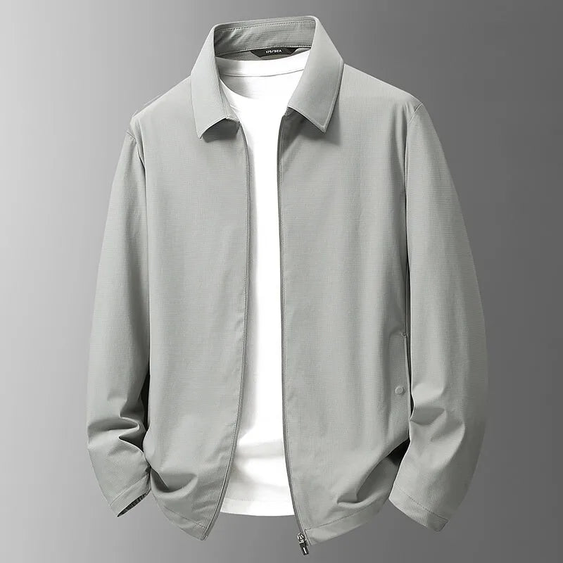 Veste technique homme imperméable, légère et respirante, conçue pour la randonnée, le sport et l'usage outdoor.