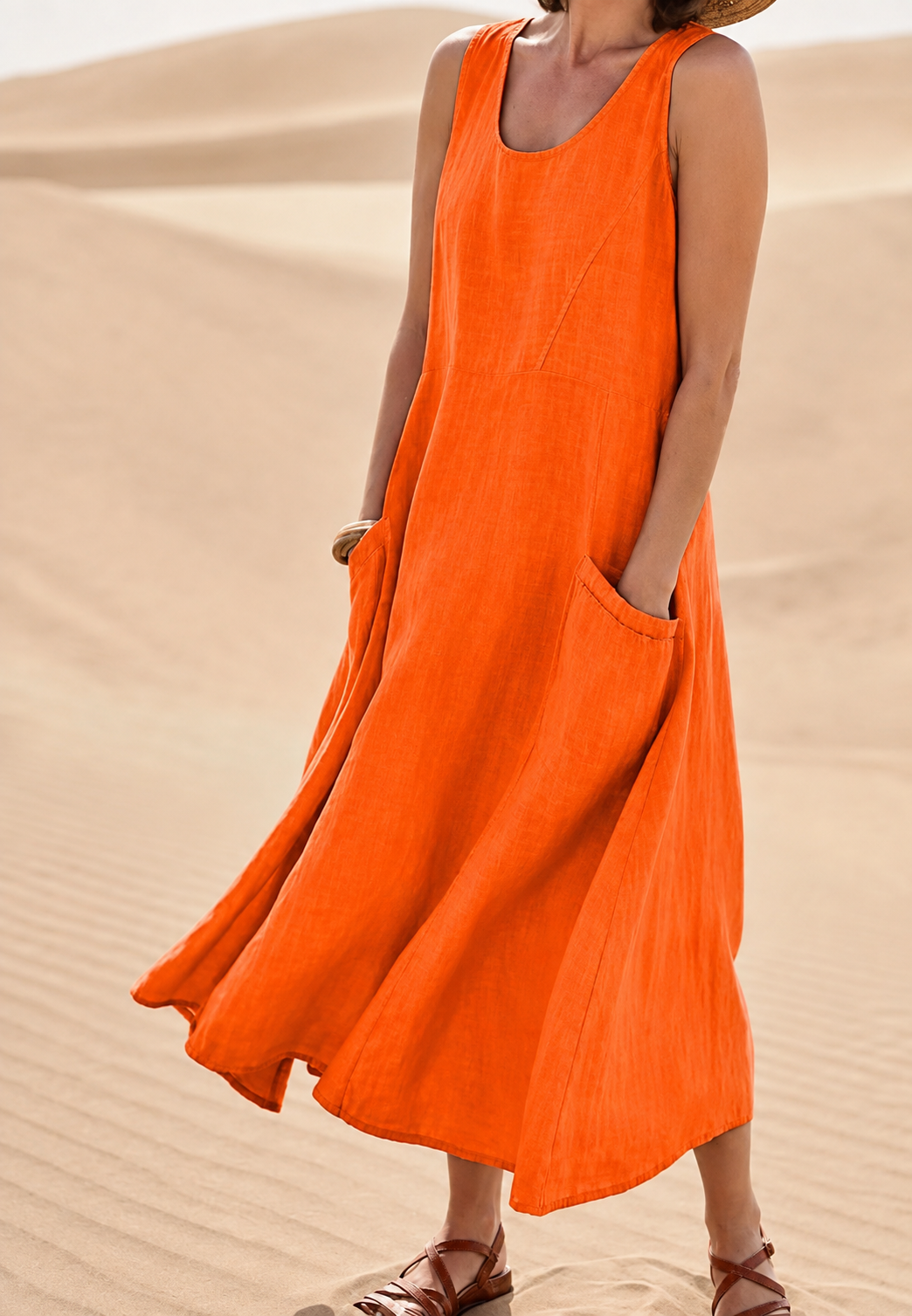 Robe d'été longue femme, sans manches, fluide et élégante avec poches. Confort optimal.