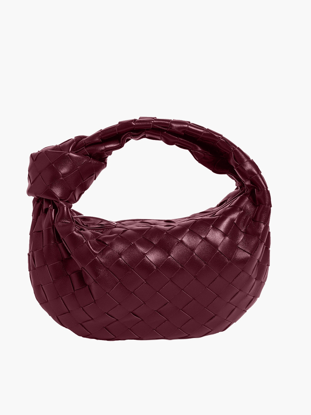 Accessoire chic: mini sac tressé, idéal pour une sortie élégante ou une soirée habillée.