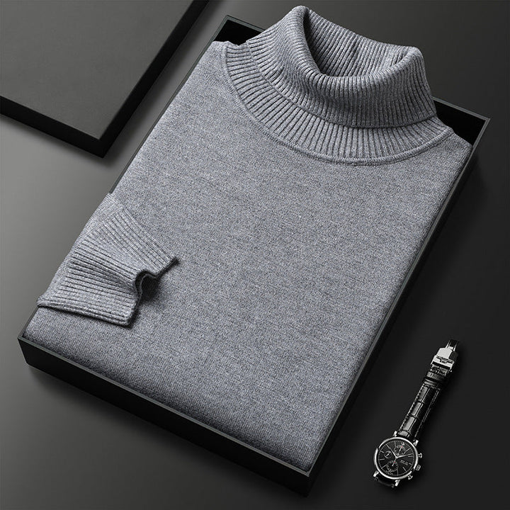 Vêtement hiver élégant : pull homme col roulé cachemire pour une mode masculine raffinée et chaude.