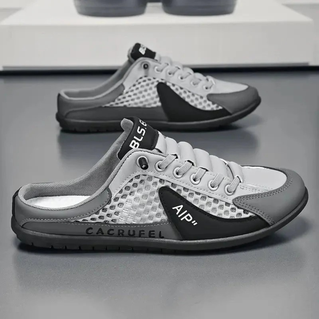 Baskets homme Elias au design ajouré élégant, ajoutant une touche de style à votre tenue estivale.