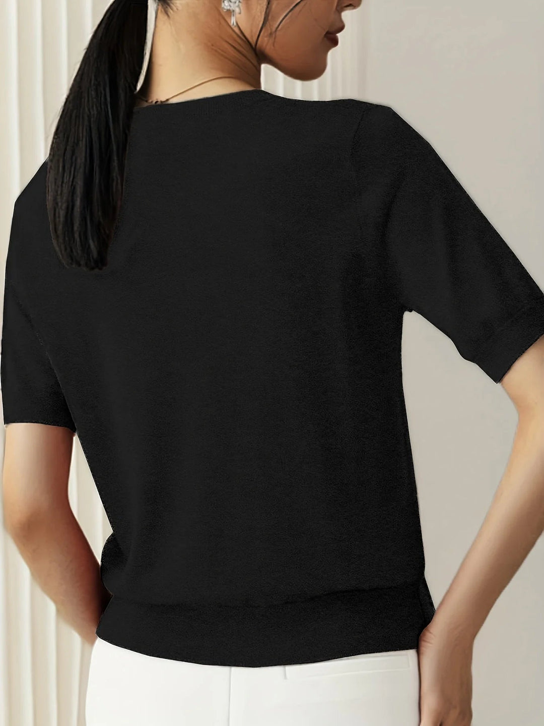 Pull décontracté femme, manches courtes, parfait pour un confort printanier ou estival léger.